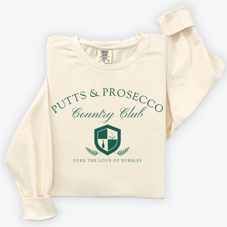 Putts and Prosecco lightweight Comfort Colors crewneck sweatshirt with vintage old-money style. Features 'Fore the Love of Bubbles' pun in an elegant design on soft cotton fabric.