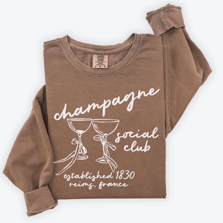 Champagne Social Club Comfort Colors lightweight crewneck sweatshirt with a boho-inspired design. Soft garment-dyed cotton, perfect for girls' nights, brunch outings, or casual celebrations.