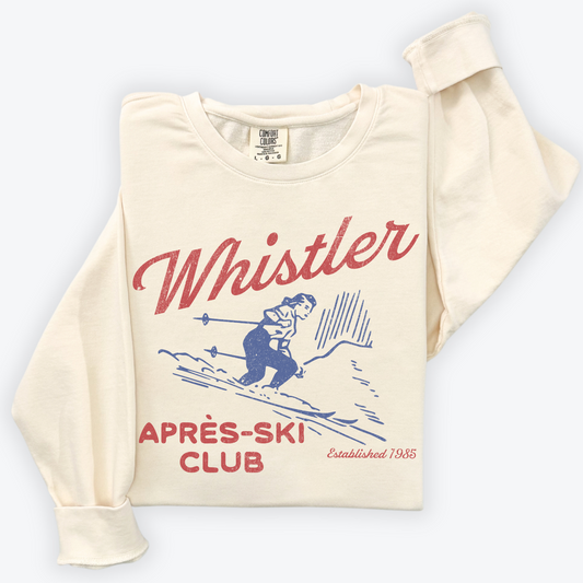 Lightweight Comfort Colors crewneck sweatshirt with "Whistler Après Ski Club" in a retro vintage style design, ideal for ski trips or cozy après-ski moments.