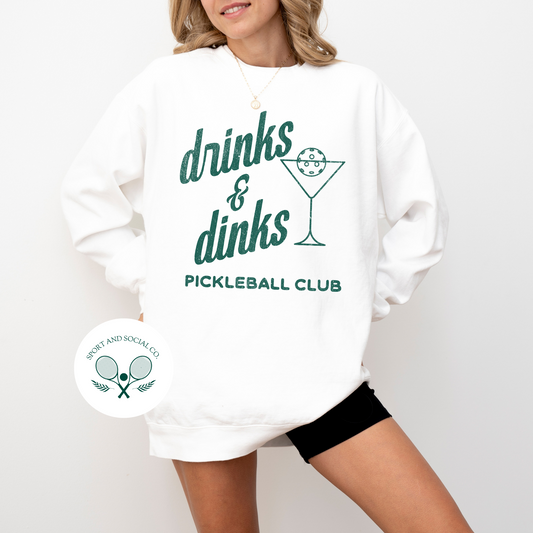 Lightweight cotton crewneck sweatshirt with "Drinks & Dinks Pickleball Club" design in vintage retro sporty style, perfect for casual wear and pickleball games.