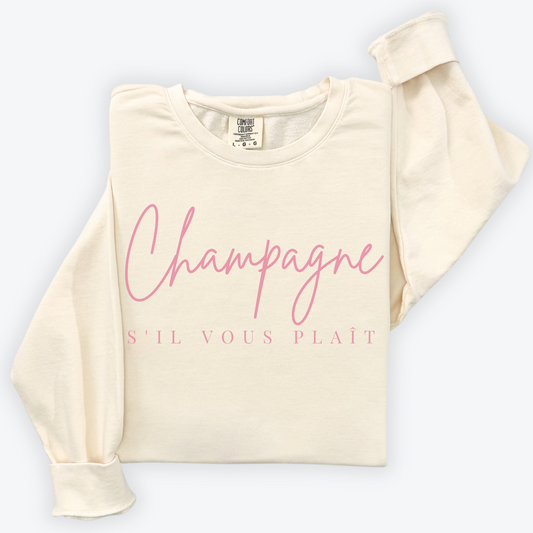 Lightweight cotton Comfort Colors crewneck sweatshirt with "Champagne, S'il Vous Plaît" text in minimalist French-inspired design. Perfect for casual outings or champagne lovers.