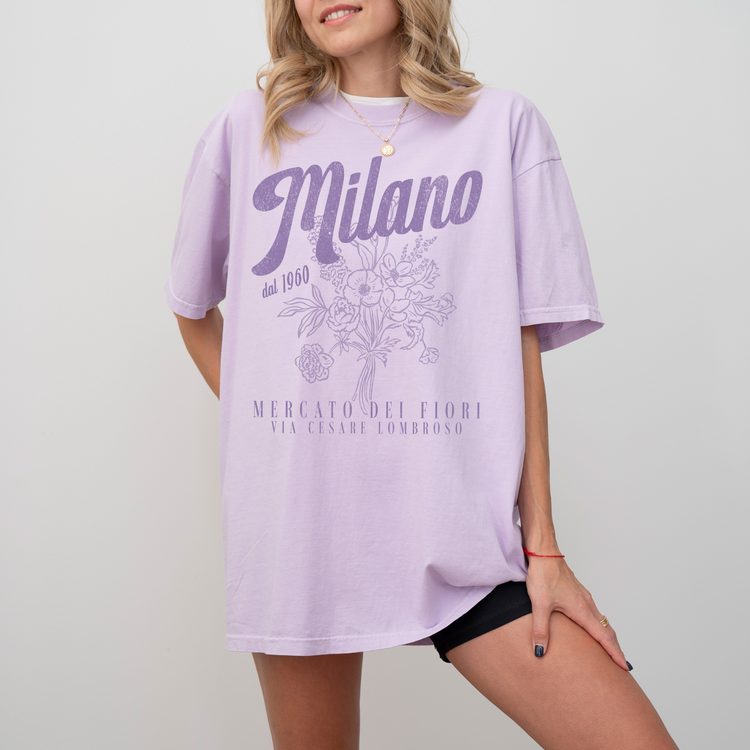 Comfort Colors short sleeve t-shirt with "Milano Mercato Dei Fiori" in a faded, vintage retro boho style, perfect for adding Italian market charm to any outfit.