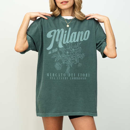 Comfort Colors short sleeve t-shirt with "Milano Mercato Dei Fiori" in a faded, vintage retro boho style, perfect for adding Italian market charm to any outfit.