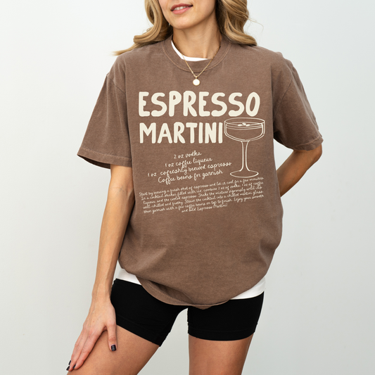 Unisex Comfort Colors short sleeve T-shirt with retro boho-style Espresso Martini print. Features the Espresso Martini recipe in faded vintage-inspired text: vodka, espresso, coffee liqueur, simple syrup (optional). Soft, cozy cotton fabric, perfect for cocktail and coffee lovers.