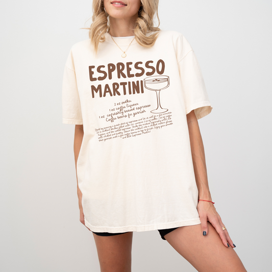 Unisex Comfort Colors short sleeve T-shirt with retro boho-style Espresso Martini print. Features the Espresso Martini recipe in faded vintage-inspired text: vodka, espresso, coffee liqueur, simple syrup (optional). Soft, cozy cotton fabric, perfect for cocktail and coffee lovers.