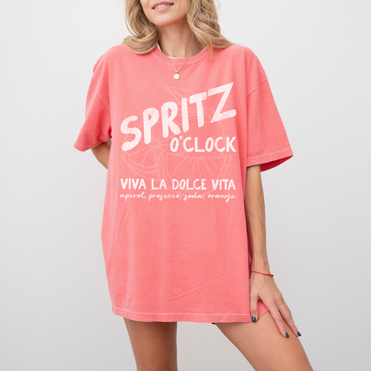 Comfort Colors short sleeve t-shirt with "Spritz O’Clock" in a faded, vintage retro style, perfect for Aperol and Campari lovers and casual, sunny afternoons.