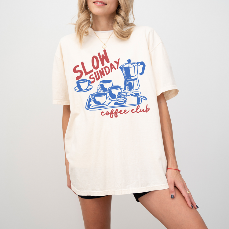 Comfort Colors short sleeve t-shirt with "Slow Sunday Coffee Club" in a faded, vintage boho style, featuring a traditional Italian moka pot for a cozy coffee lover’s look.