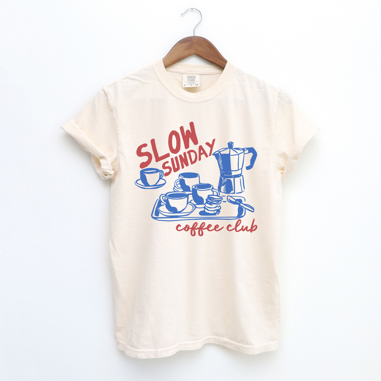 Comfort Colors short sleeve t-shirt with "Slow Sunday Coffee Club" in a faded, vintage boho style, featuring a traditional Italian moka pot for a cozy coffee lover’s look.