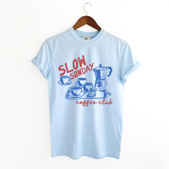 Comfort Colors short sleeve t-shirt with "Slow Sunday Coffee Club" in a faded, vintage boho style, featuring a traditional Italian moka pot for a cozy coffee lover’s look.