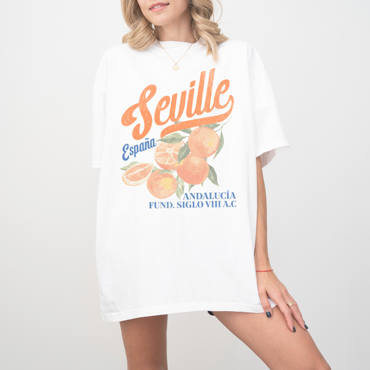 Comfort Colors short sleeve t-shirt with vintage "Seville, España" design in boho style, featuring oranges for a retro, faded look.