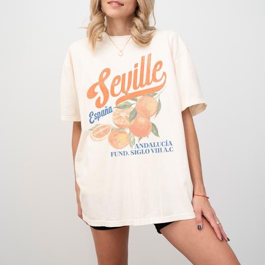 Comfort Colors short sleeve t-shirt with vintage "Seville, España" design in boho style, featuring oranges for a retro, faded look.