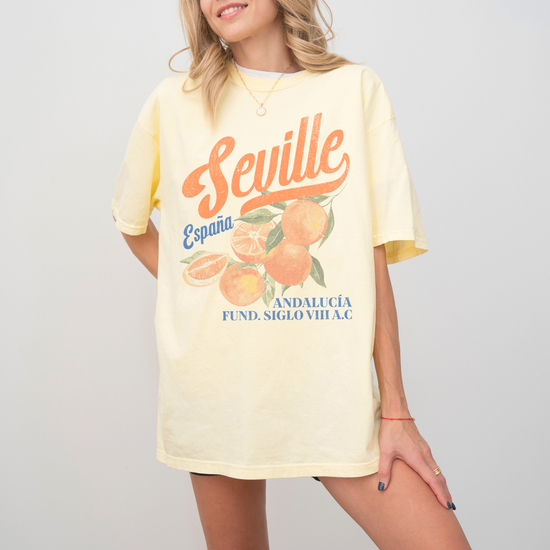 Comfort Colors short sleeve t-shirt with vintage "Seville, España" design in boho style, featuring oranges for a retro, faded look.