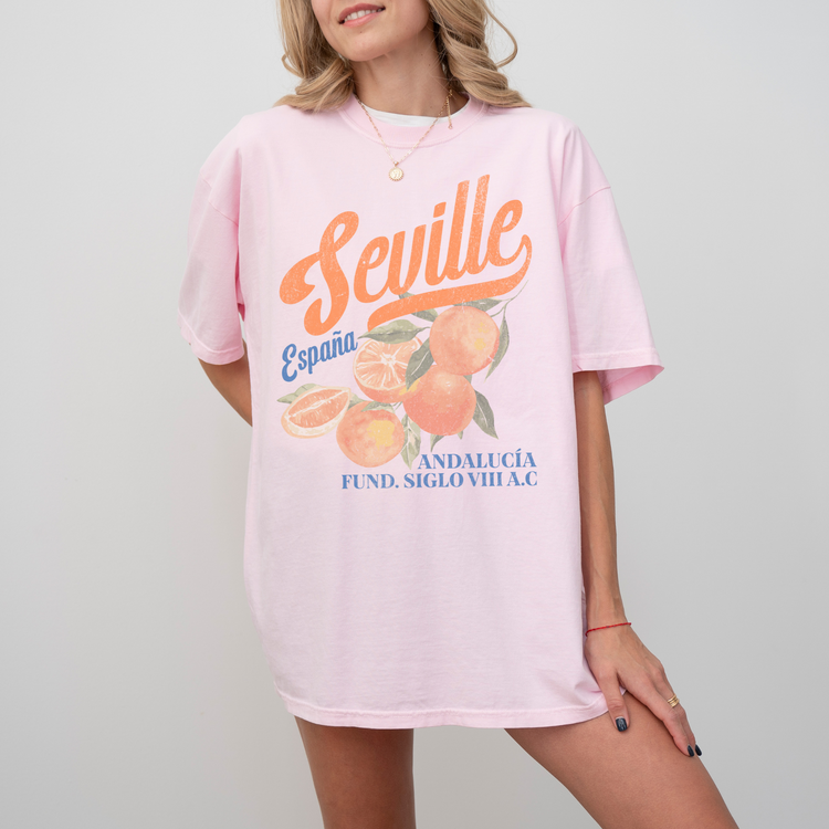 Comfort Colors short sleeve t-shirt with vintage "Seville, España" design in boho style, featuring oranges for a retro, faded look.