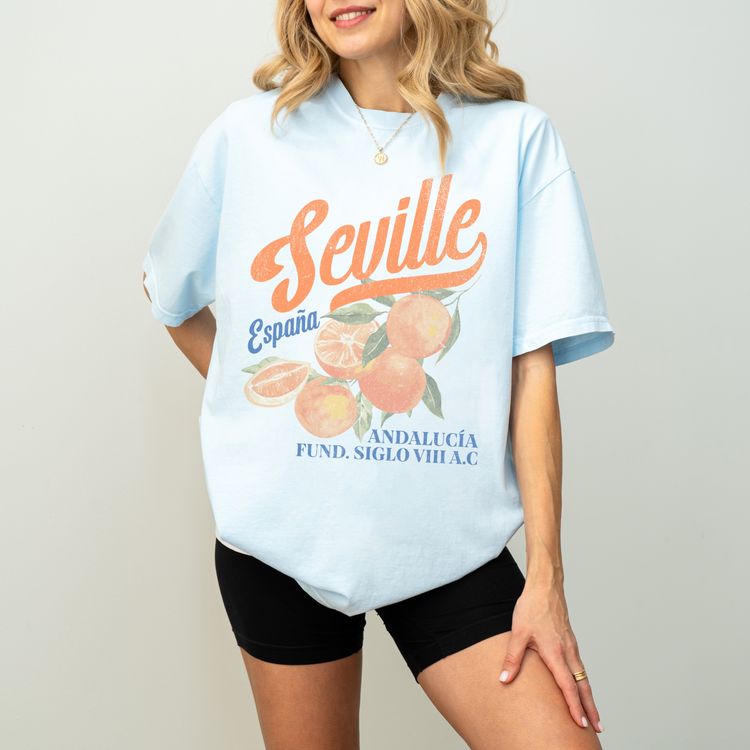 Comfort Colors short sleeve t-shirt with vintage "Seville, España" design in boho style, featuring oranges for a retro, faded look.