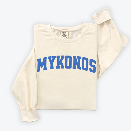 Lightweight cotton crewneck sweatshirt with "Mykonos" in a classic university font, perfect for travel days or casual wear, inspired by the relaxed vibe of the Greek islands.