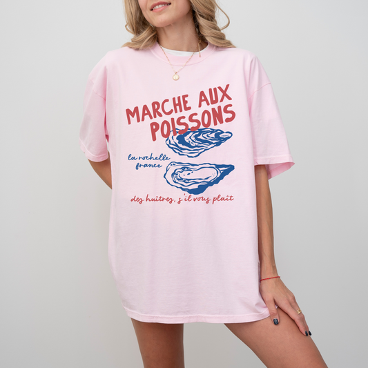 Comfort Colors short sleeve t-shirt with "Marché de Poisson" in a faded, vintage retro boho style, featuring oyster graphics for a French market-inspired look.