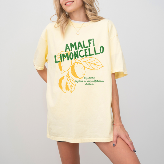 Comfort Colors short sleeve t-shirt with "Amalfi Limoncello" in vintage retro boho style, featuring faded lemon graphics for a grunge-inspired, Italian summer look.