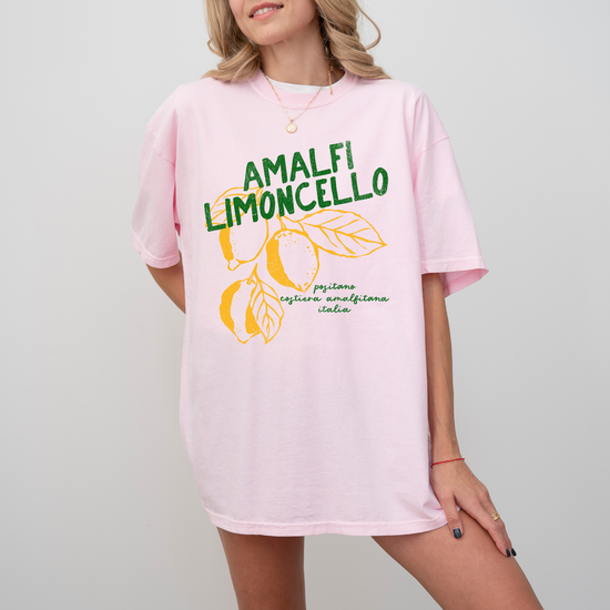 Comfort Colors short sleeve t-shirt with "Amalfi Limoncello" in vintage retro boho style, featuring faded lemon graphics for a grunge-inspired, Italian summer look.