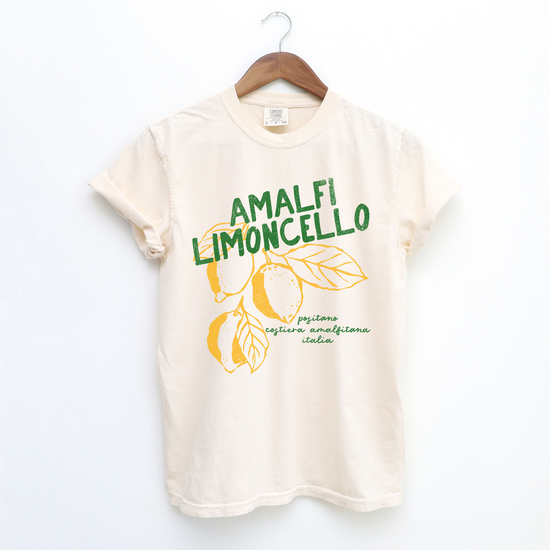 Comfort Colors short sleeve t-shirt with "Amalfi Limoncello" in vintage retro boho style, featuring faded lemon graphics for a grunge-inspired, Italian summer look.