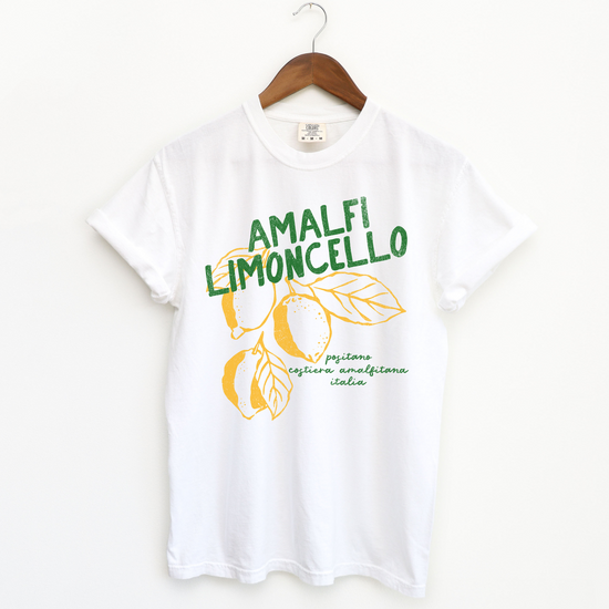 Comfort Colors short sleeve t-shirt with "Amalfi Limoncello" in vintage retro boho style, featuring faded lemon graphics for a grunge-inspired, Italian summer look.