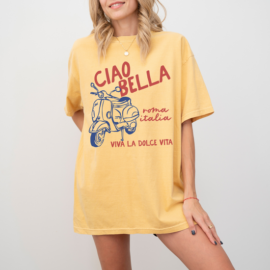 Comfort Colors short sleeve t-shirt with "Ciao Bella" and a Vespa graphic, featuring "Roma, Italia" in a vintage Italian style, perfect for casual wear and travel-inspired looks.