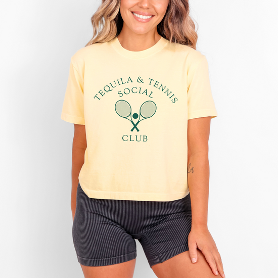 Women's boxy Comfort Colors tee with 'Tequila and Tennis Social Club' print. Vintage athletic aesthetic, relaxed fit, soft fabric. Perfect for casual, sporty style with a playful twist.