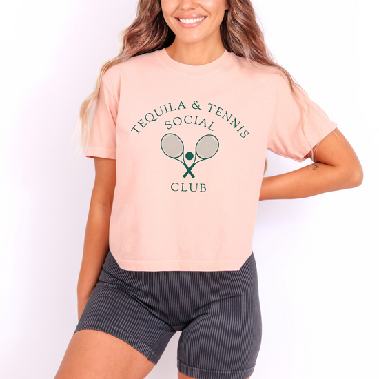 Women's boxy Comfort Colors tee with 'Tequila and Tennis Social Club' print. Vintage athletic aesthetic, relaxed fit, soft fabric. Perfect for casual, sporty style with a playful twist.