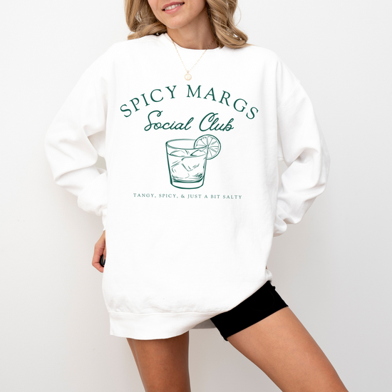 A Comfort Colors lightweight cotton crewneck sweatshirt with "Spicy Margs Social Club" printed in a fun, vintage retro style, ideal for girls' trips, bachelorette parties, or as a spirited gift.