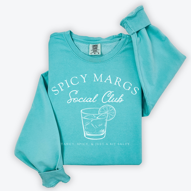 A Comfort Colors lightweight cotton crewneck sweatshirt with "Spicy Margs Social Club" printed in a fun, vintage retro style, ideal for girls' trips, bachelorette parties, or as a spirited gift.