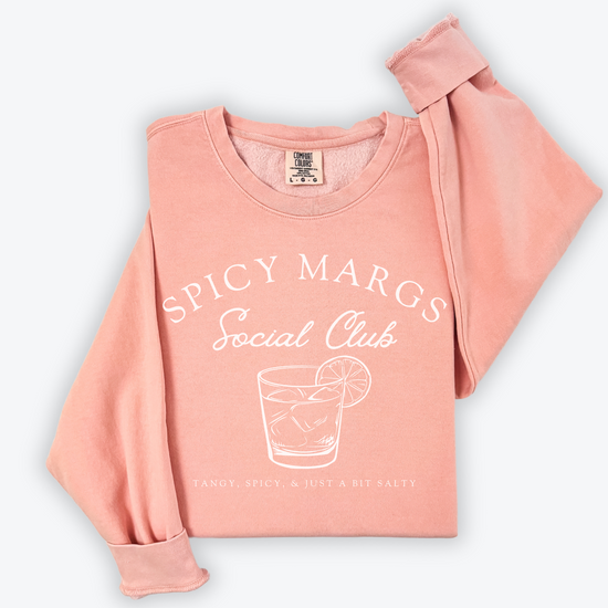 A Comfort Colors lightweight cotton crewneck sweatshirt with "Spicy Margs Social Club" printed in a fun, vintage retro style, ideal for girls' trips, bachelorette parties, or as a spirited gift.