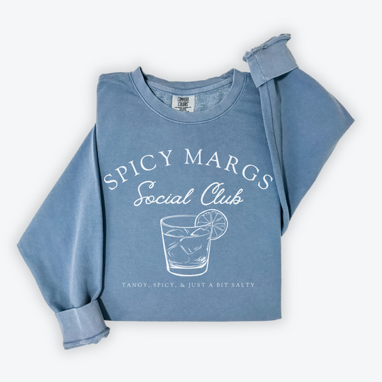 A Comfort Colors lightweight cotton crewneck sweatshirt with "Spicy Margs Social Club" printed in a fun, vintage retro style, ideal for girls' trips, bachelorette parties, or as a spirited gift.