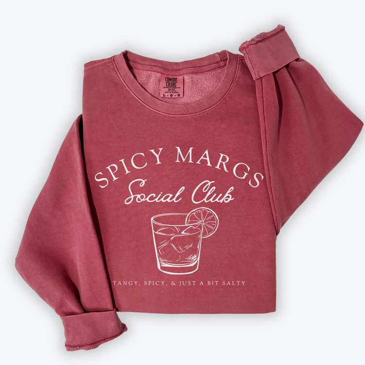 A Comfort Colors lightweight cotton crewneck sweatshirt with "Spicy Margs Social Club" printed in a fun, vintage retro style, ideal for girls' trips, bachelorette parties, or as a spirited gift.