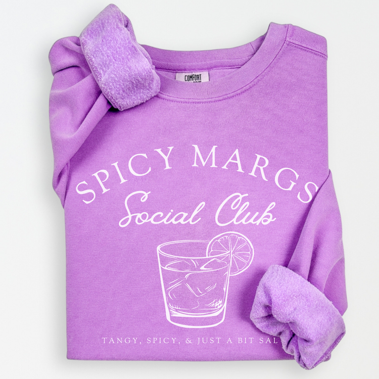 A Comfort Colors lightweight cotton crewneck sweatshirt with "Spicy Margs Social Club" printed in a fun, vintage retro style, ideal for girls' trips, bachelorette parties, or as a spirited gift.