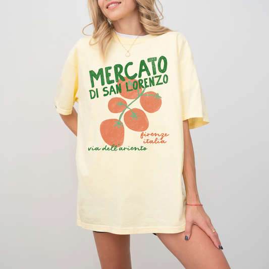 A Comfort Colors short sleeve t-shirt with "Mercato di San Lorenzo, Firenze Italia" and an illustration of tomatoes in a grunge, vintage retro style, inspired by Italian market culture.