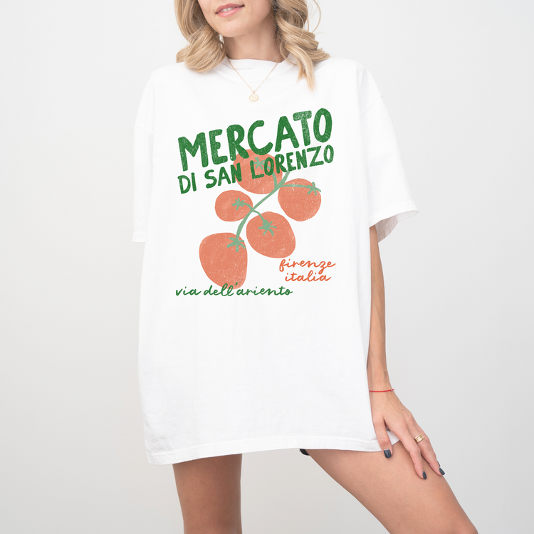 A Comfort Colors short sleeve t-shirt with "Mercato di San Lorenzo, Firenze Italia" and an illustration of tomatoes in a grunge, vintage retro style, inspired by Italian market culture.