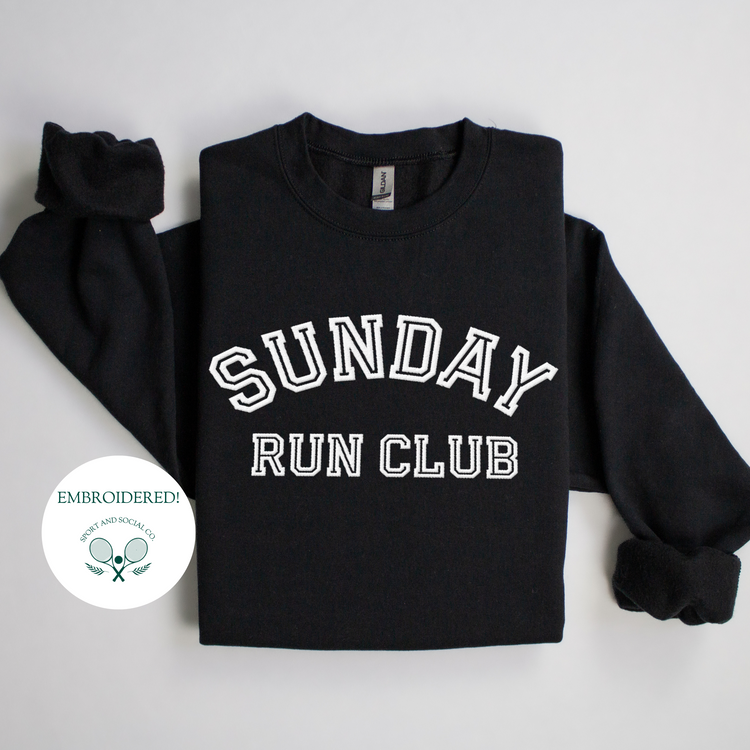 A sweatshirt with "Sunday Run Club" embroidered in bold white stitching across the front, approximately 10 inches wide. The design has a sporty, vintage-inspired look, ideal for casual athleisure wear or workouts.