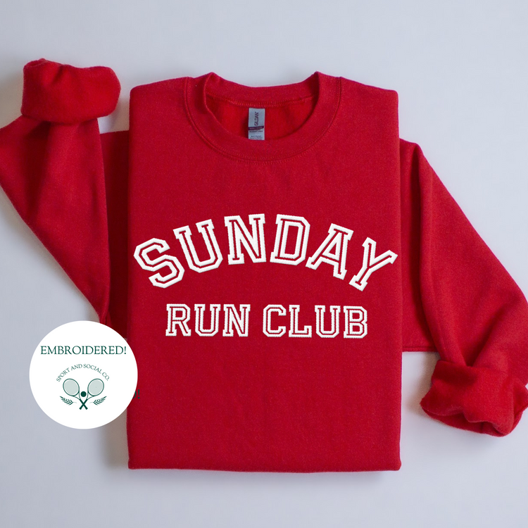 A sweatshirt with "Sunday Run Club" embroidered in bold white stitching across the front, approximately 10 inches wide. The design has a sporty, vintage-inspired look, ideal for casual athleisure wear or workouts.