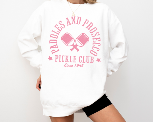 Paddles and Prosecco Pickle Club lightweight cotton crewneck sweatshirt with a pink vintage, faded print, font, model view, white color